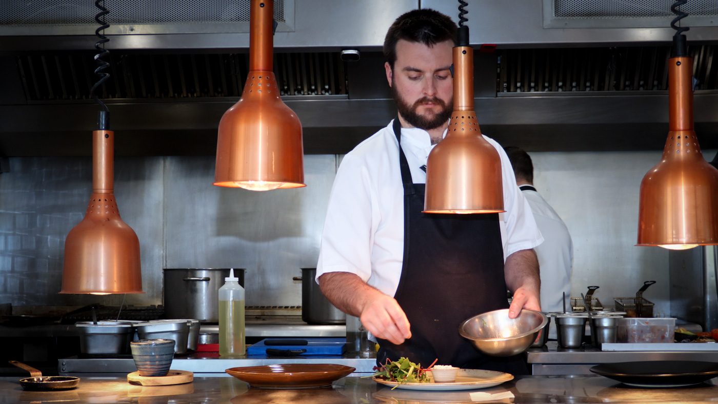 Weaving Shed chef preparing food in the kitchen