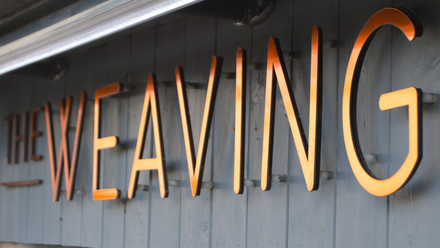 Closeup of Weaving Shed sign