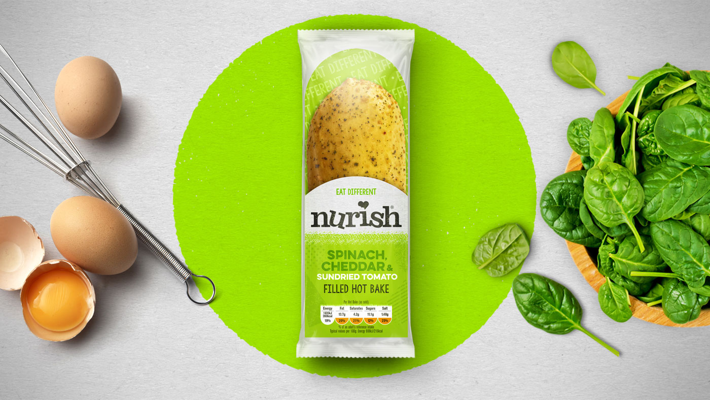 Top down shot of Nurish Spinach, Cheddar & Sun-dried Tomatoes packaging design.