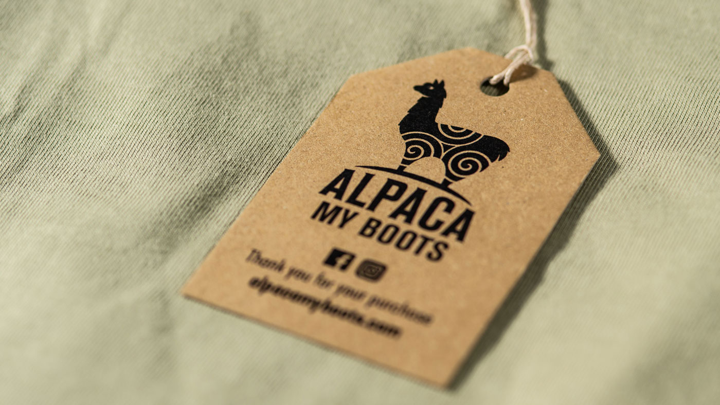 Closeup shot of Alpaca My Boots clothing tag