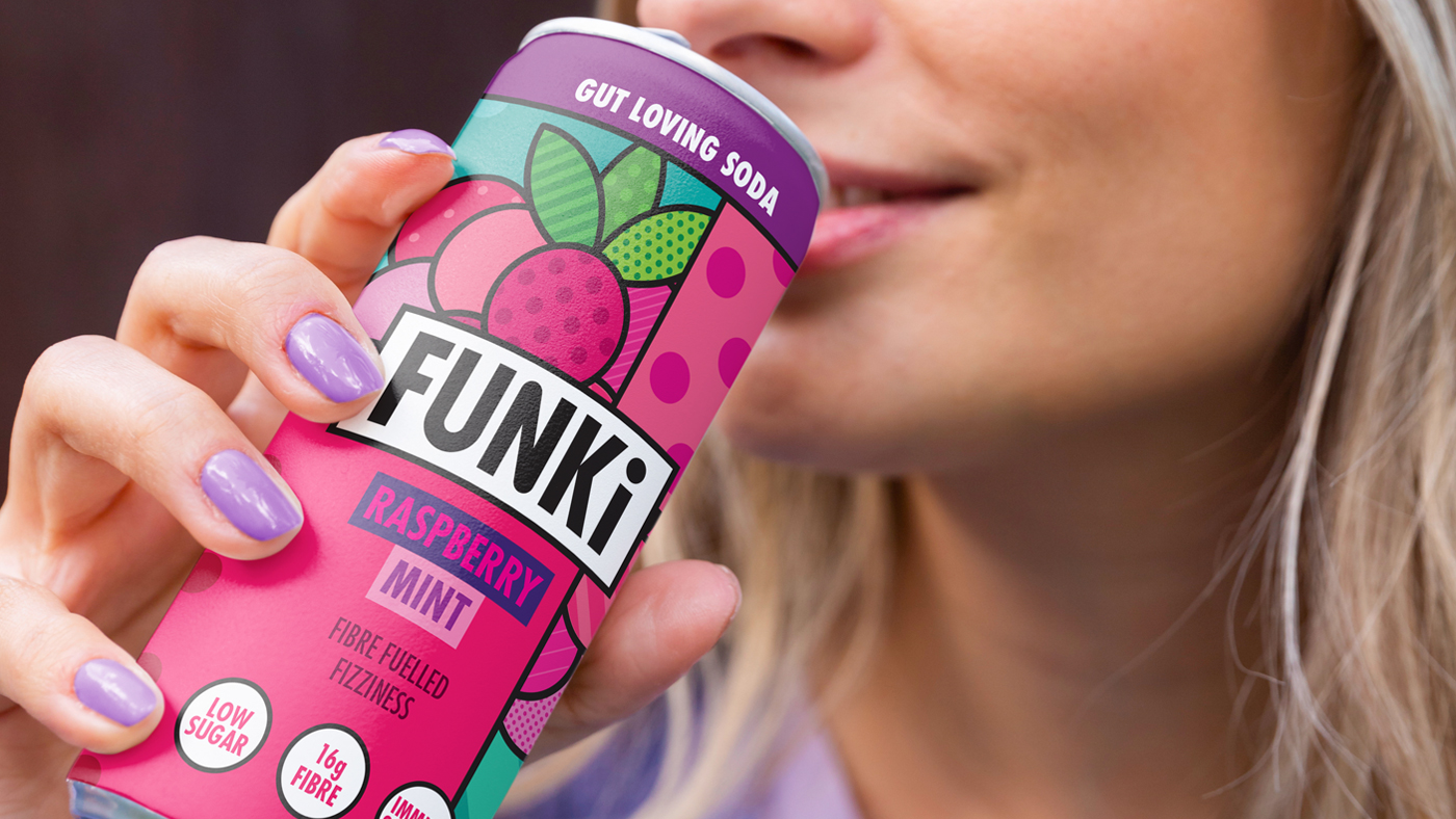Girl drinking a can of FUNKi