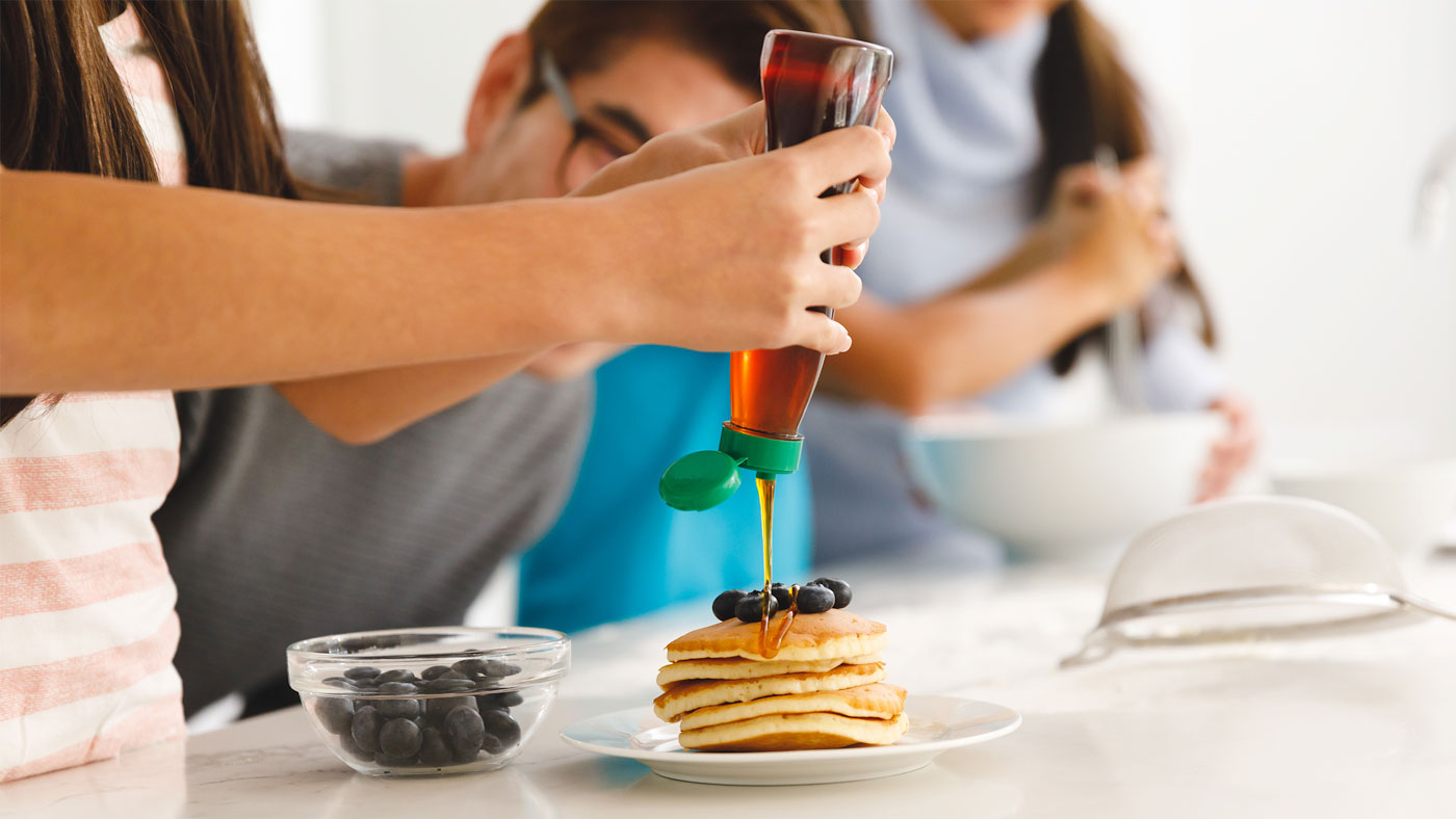 Family enjoying breakfast together